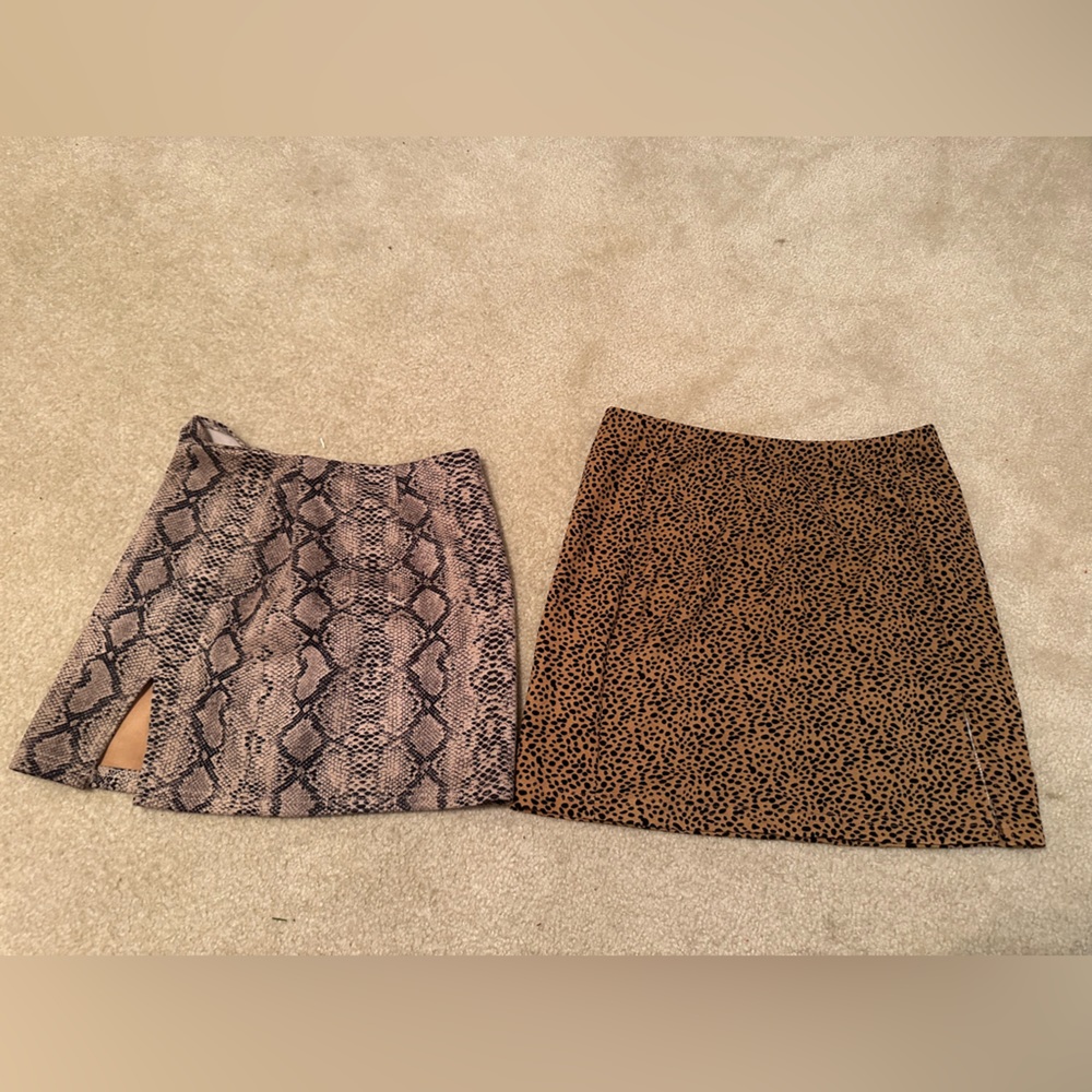 Two animal print Skirts one with a slit. Super cute